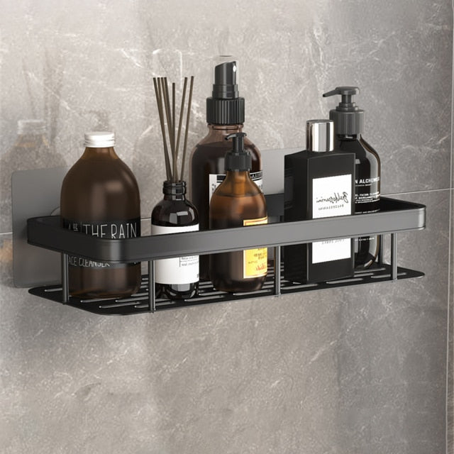 Black suction cup bathroom shelf for organized shower storage. Easy, tool-free install.