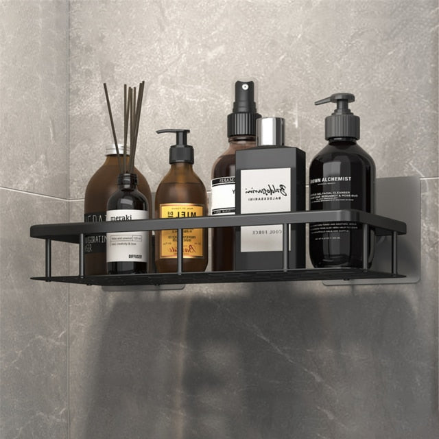 Versatile silver suction shelf, perfect for bathroom storage or shower essentials, tool-free.