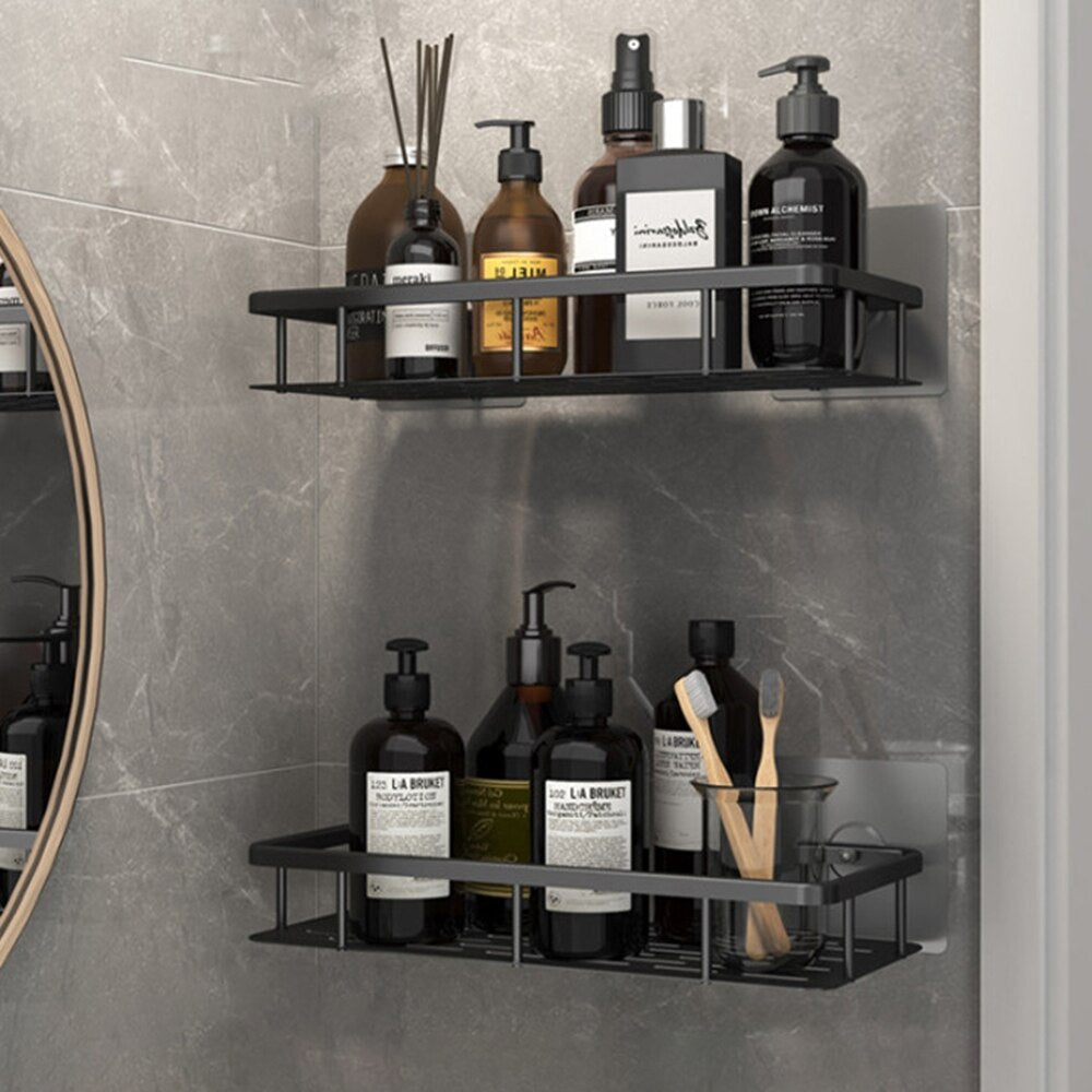 No-drill black suction shower shelf, easy to reposition, strong wall organizer for toiletries.