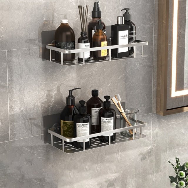 Rust-proof silver suction bathroom storage shelf, durable home organization solution.