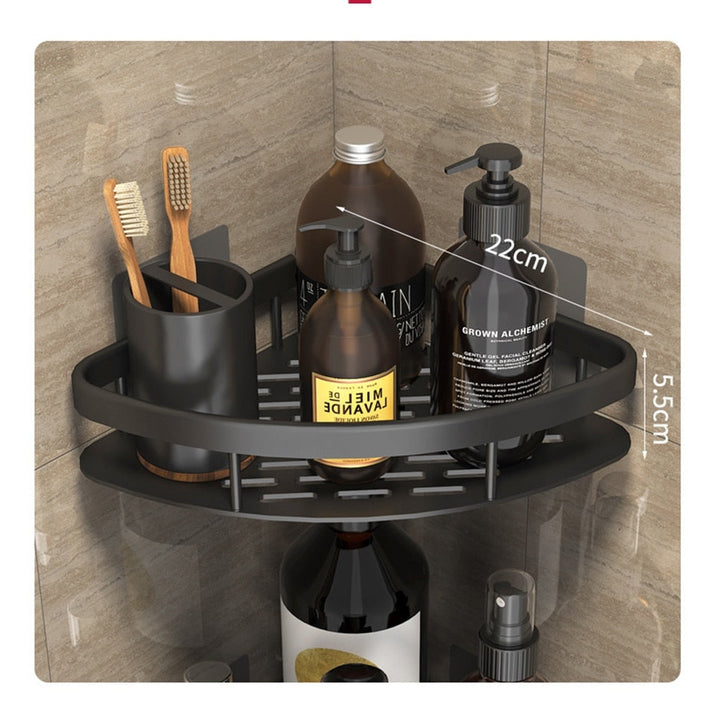 Secure silver suction bathroom shelf, enhances home organization without drilling.