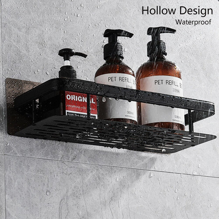 Silver suction shower caddy, wall organizer for bathroom storage, space-saving design.