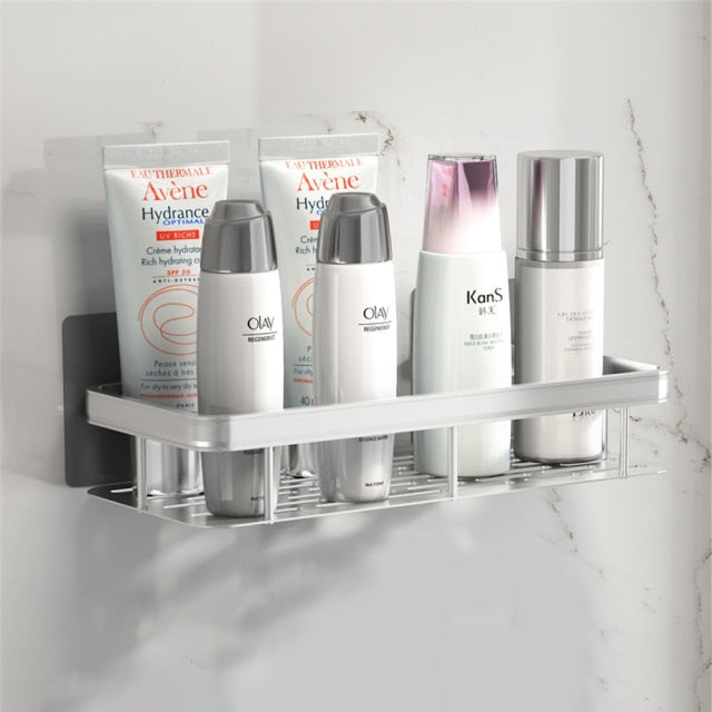 Home organization black suction shelf for bathroom essentials; quick, tool-free mounting.