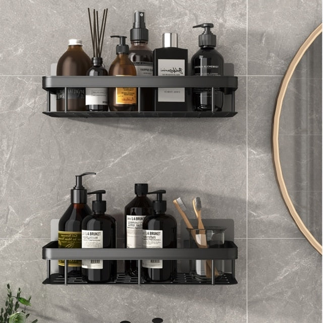 Tool-free silver bathroom storage shelf with strong suction cups for shower organization.