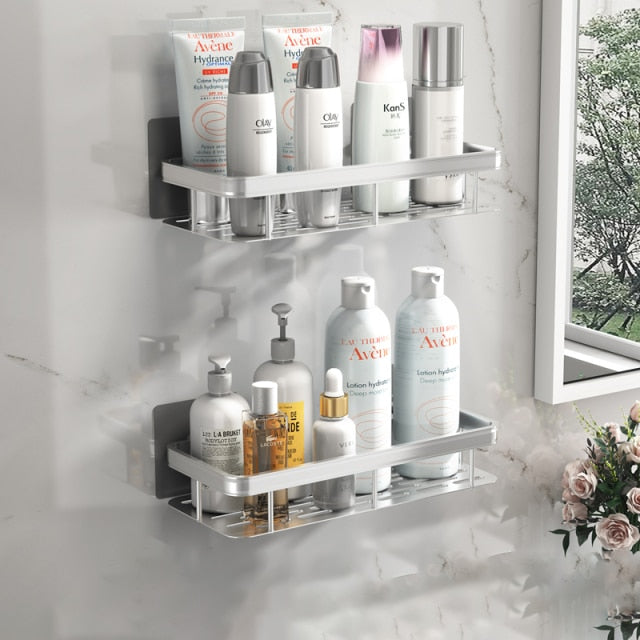 Organize your shower with a black suction cup wall shelf, ideal for shampoos & soaps.