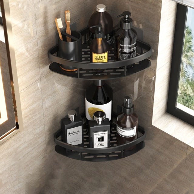 Black suction bathroom shelf, ideal for shampoos & soaps, space-saving home organization.