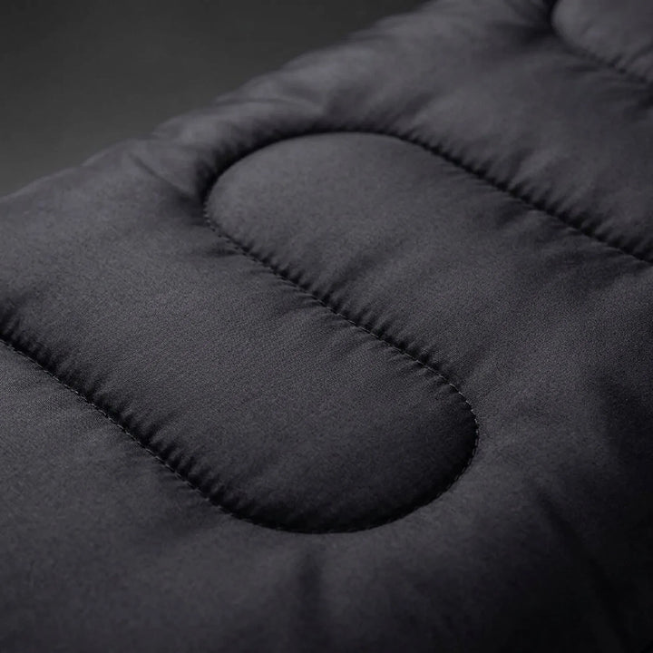 Black envelope-style sleeping bag. Lightweight & portable for hiking, camping, and outdoor adventures.