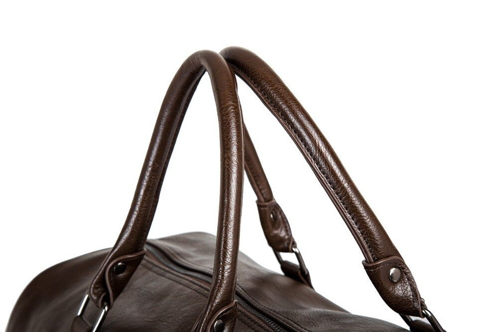 Elegant brown faux leather duffel, unisex and lightweight for all your stylish travel requirements.