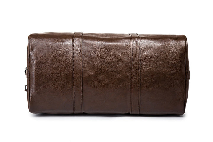 Black faux leather duffel bag, lightweight and roomy, great for gym gear or short trips.