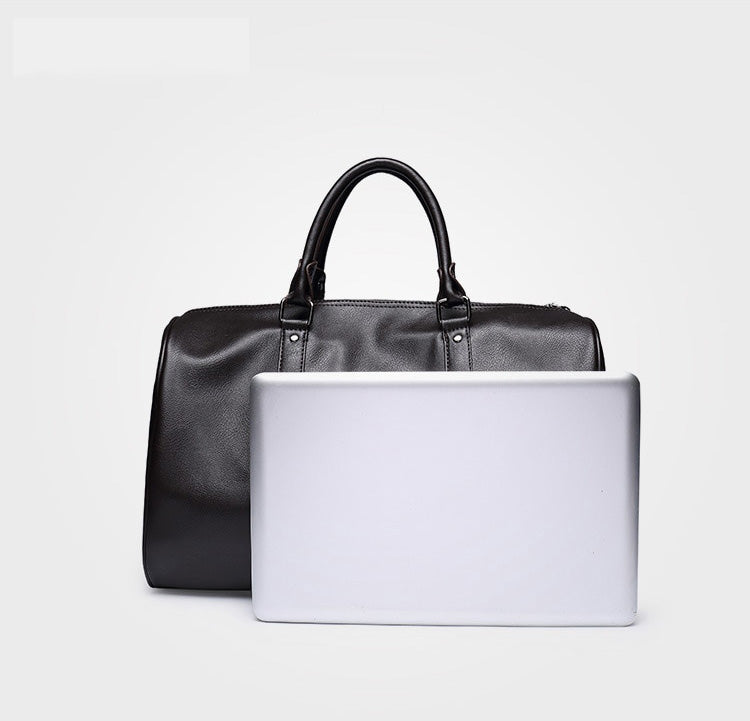 Brown faux leather gym bag, lightweight & spacious, perfect for daily use or as a travel duffel.