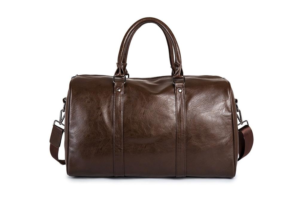 Sleek black faux leather duffel bag, lightweight & versatile for travel, gym, or weekend trips.