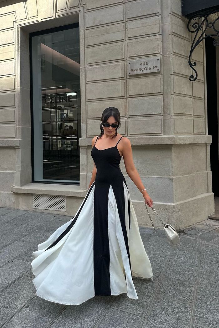 Elegant black & white wedding guest maxi dress, sophisticated special occasion wear.
