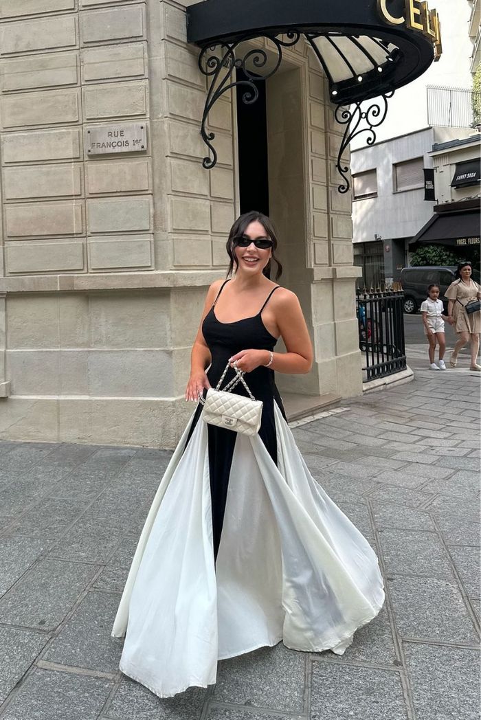 Women's formal black and white contrast maxi dress for wedding guests.