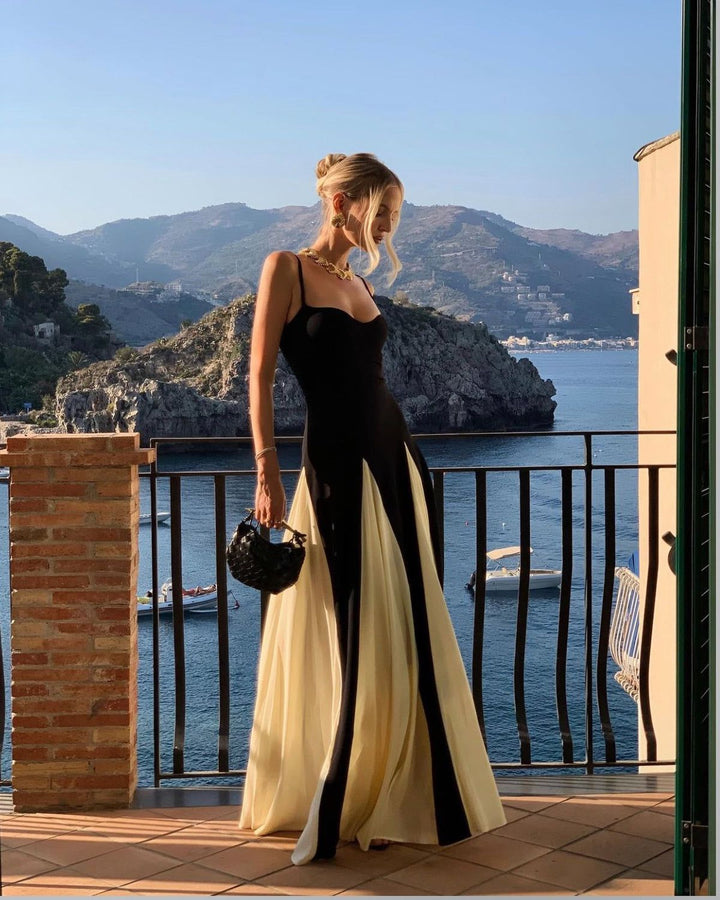 Formal black & white maxi dress with sweetheart neckline, ideal for gala events.