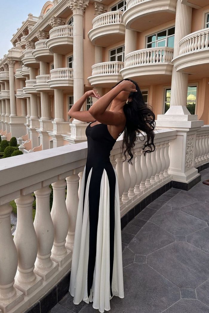 Stylish black & white contrast maxi wedding guest gown, elegant design.