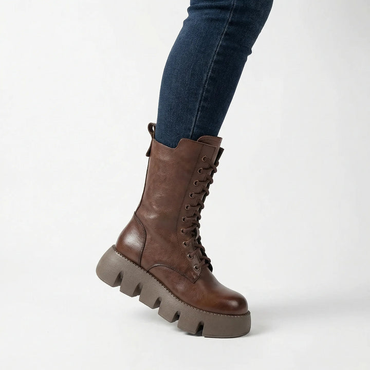 Comfortable women's arch support platform combat boots with secure lace-up closure & rugged non-slip sole.