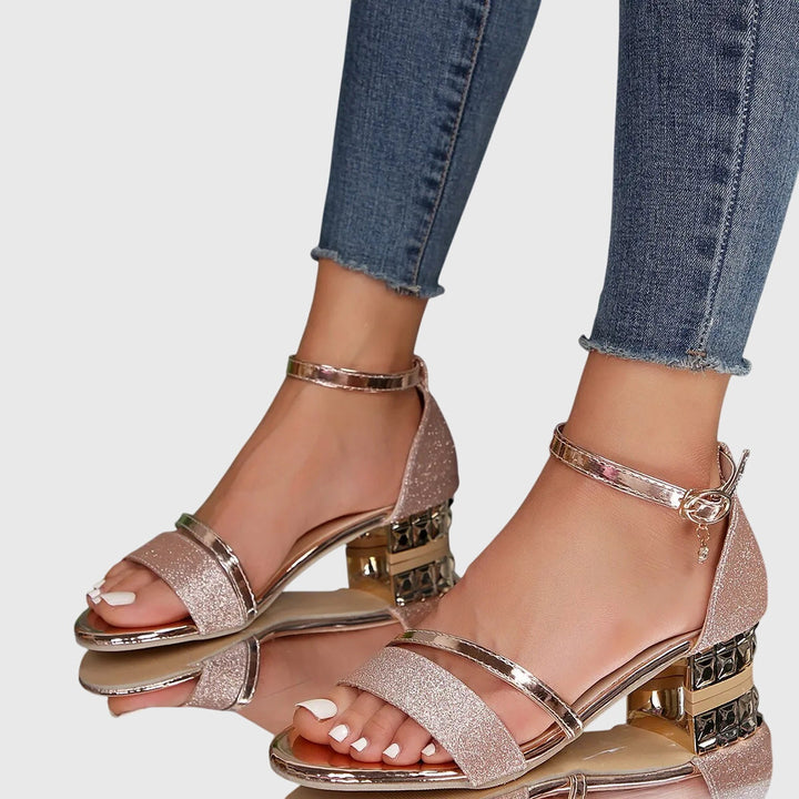 Stylish gold women's heeled sandals with orthopedic features, adjustable fit, & all-day comfort for dressy wear.