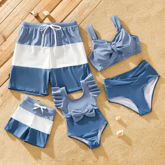 Blue family matching swimwear set for beach or pool, coordinated vacation style