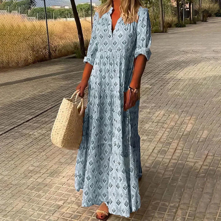 Bohemian V-neck maxi dress for women, with long sleeves & flowy design. Perfect for summer, beach, or casual wear.