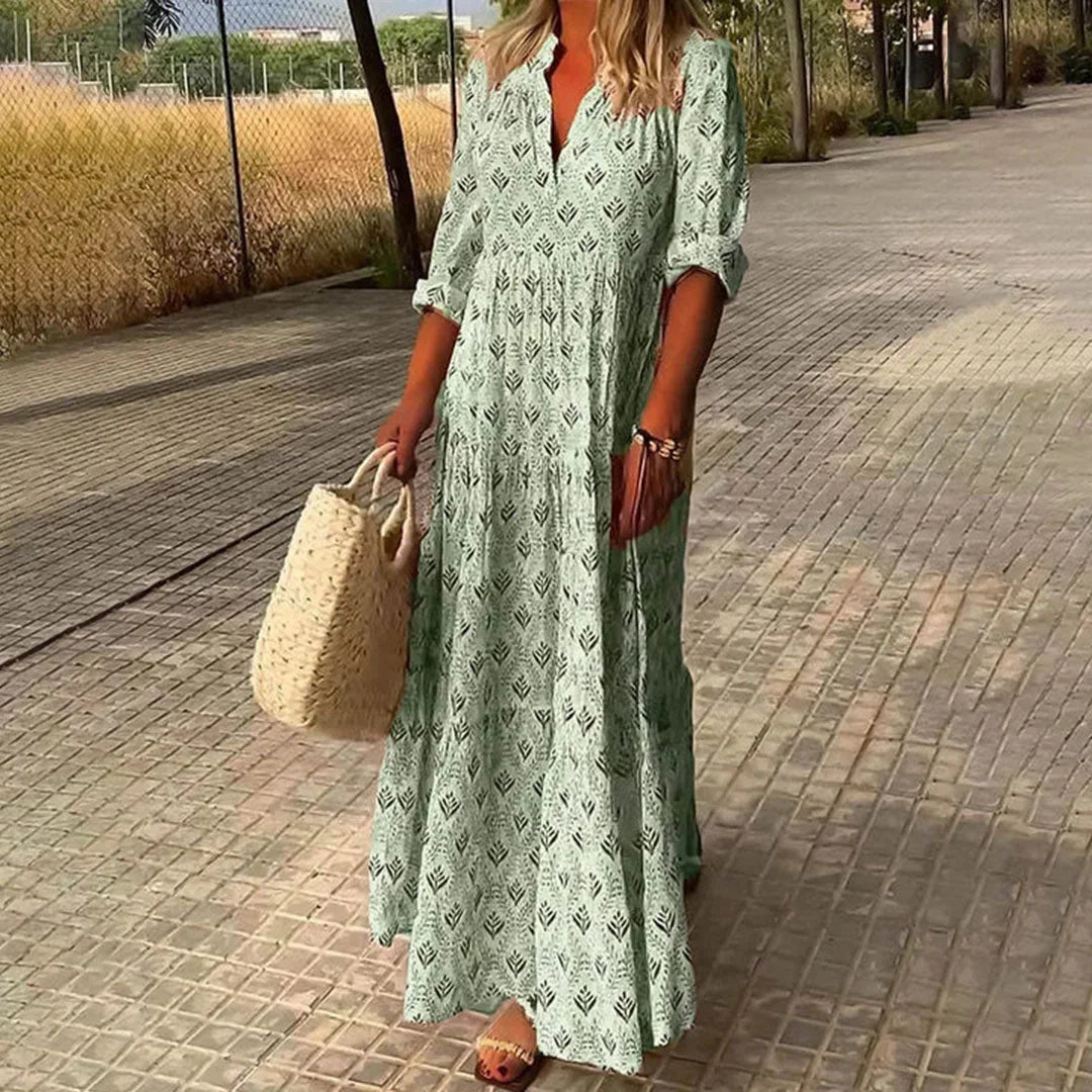 Flowy women's bohemian maxi dress, V-neck & long sleeves. Great for summer, beach vacation, or comfortable casual wear.