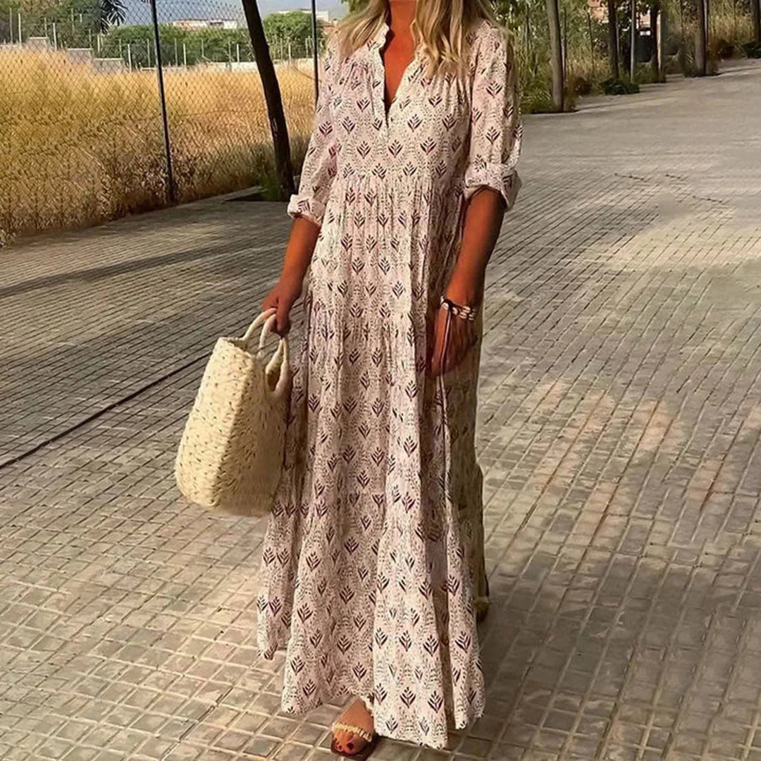 Women's long sleeve bohemian V-neck maxi dress with a relaxed, flowy fit. Perfect comfortable summer casual wear.