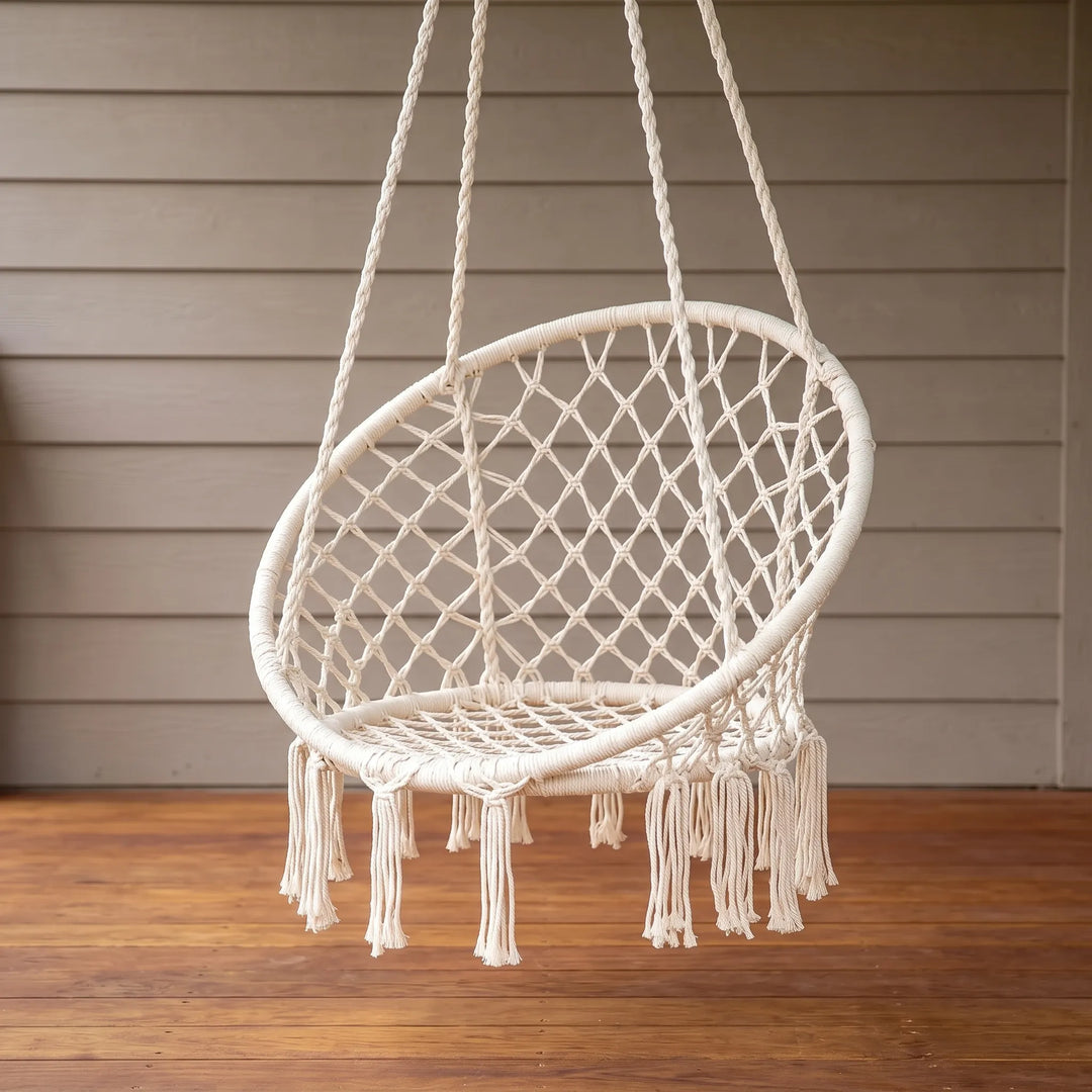 Cozy indoor macrame hammock chair swing, perfect boho accent furniture for a stylish living space.