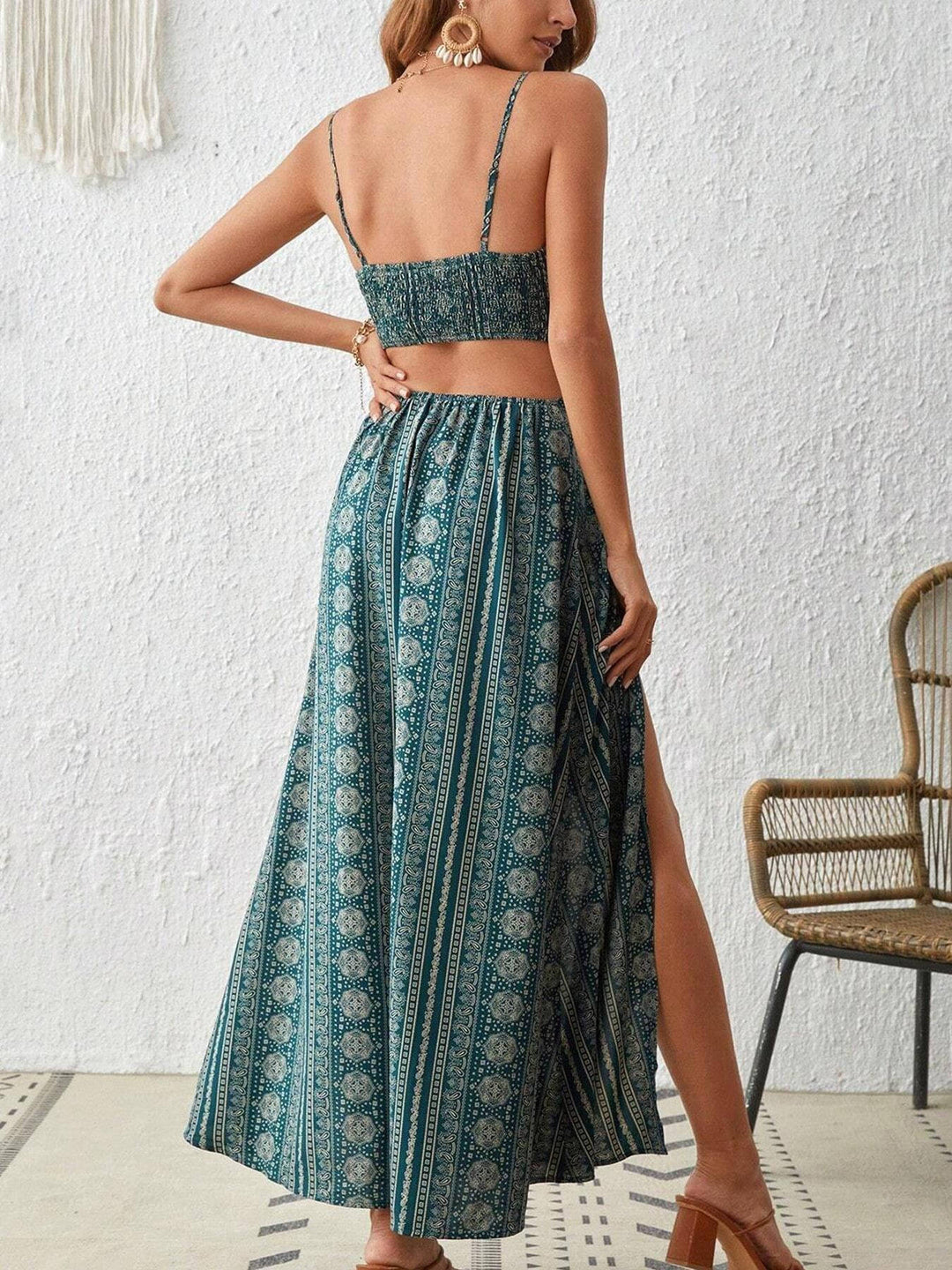 Chic women's boho printed maxi sundress, perfect for summer fashion. Features smocked back and flattering side slits.