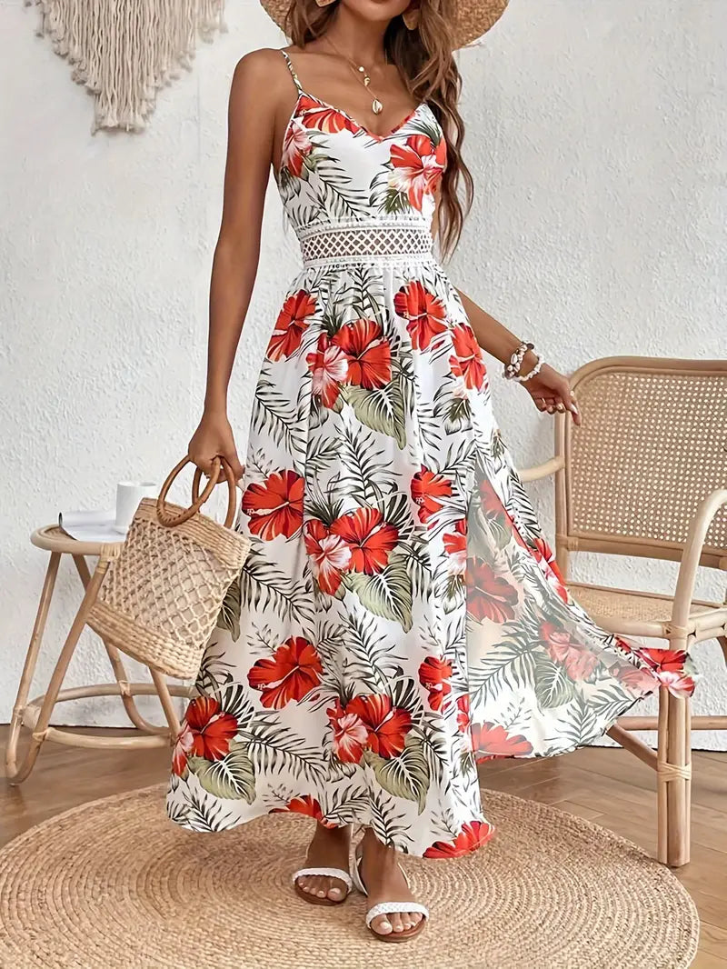 Sleeveless A-line boho maxi dress featuring a vibrant tropical palm print & delicate crochet V-neck for wedding guests.