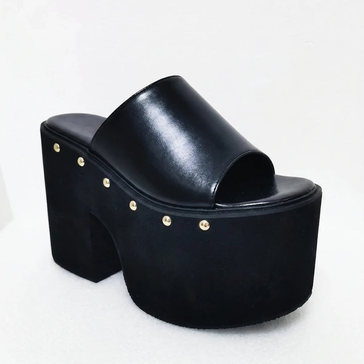 Stylish women's black platform sandals with a 5.5-inch block heel. Perfect high-heel summer fashion statement shoes.