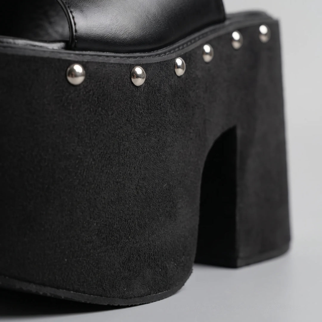 Chunky 5.5-inch block heel black platform sandals for women. Open-toe slip-on footwear, ideal for bold fashion.
