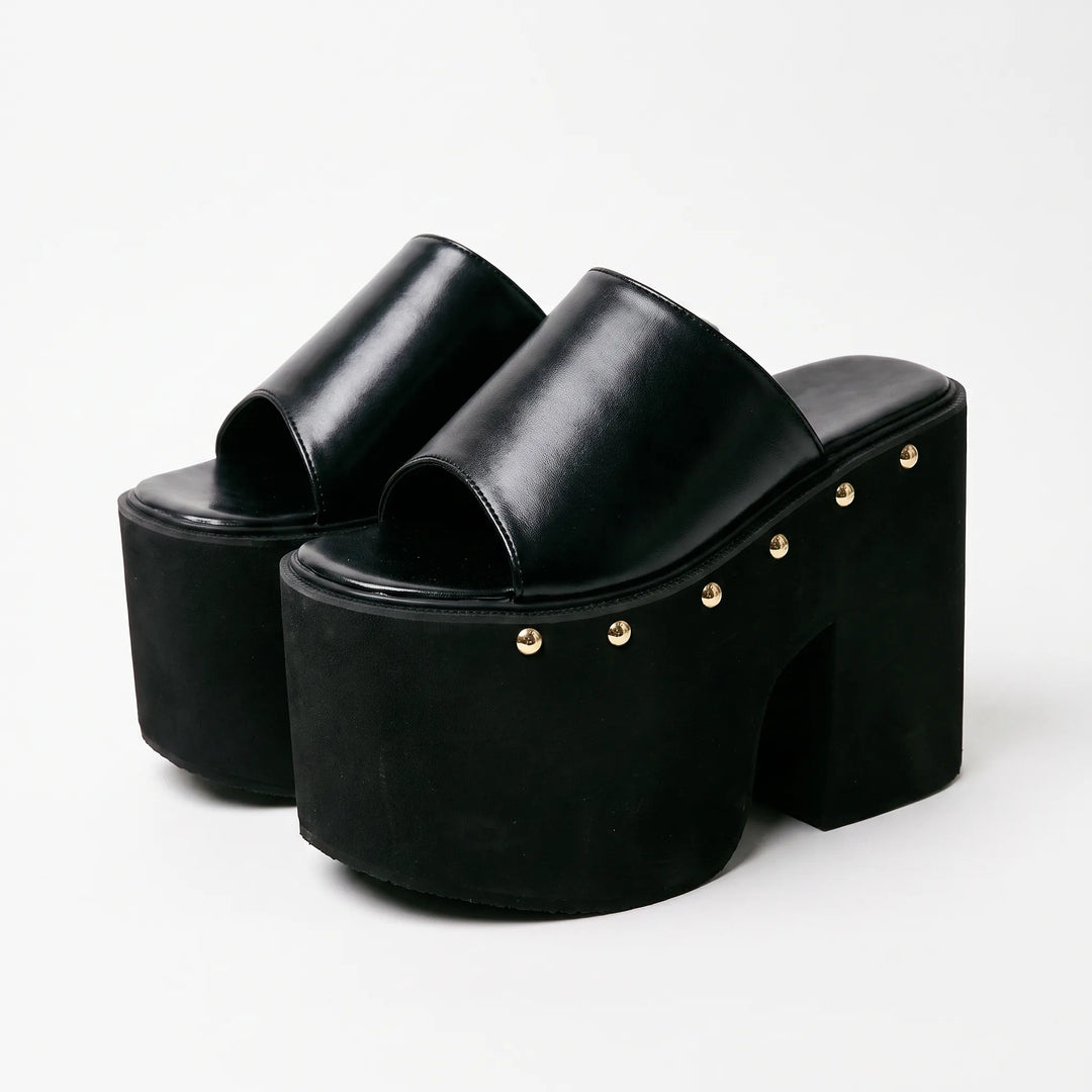 Women's black platform sandals with a 5.5-inch block heel. Chunky, open-toe slip-on design, perfect for summer fashion.
