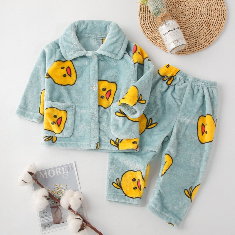 Kids' cozy flannel pajamas with 'sweet dreams' embroidery, soft winter sleepwear for children.
