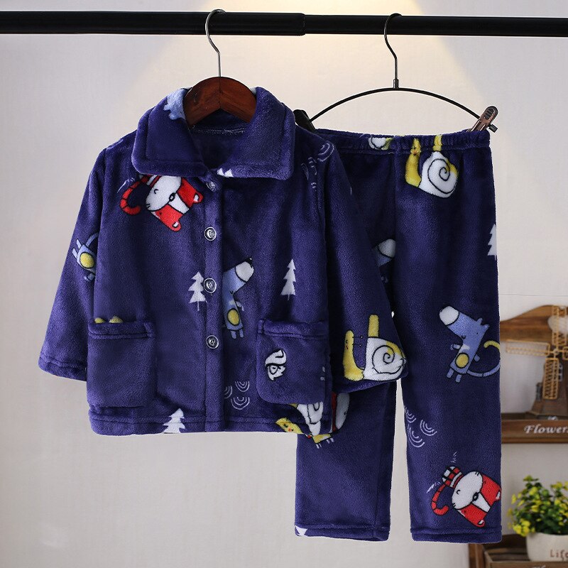 Red plaid flannel pajama set hanging, showcasing soft texture and quality kids' winter sleepwear.
