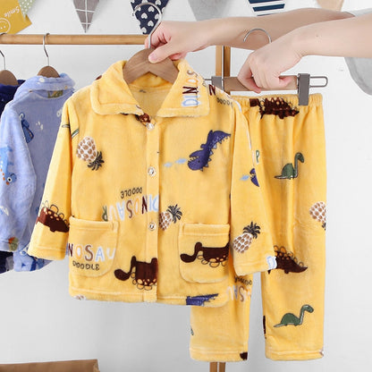 Happy girl in comfortable red flannel pajamas, ideal long-sleeve winter sleepwear for kids.