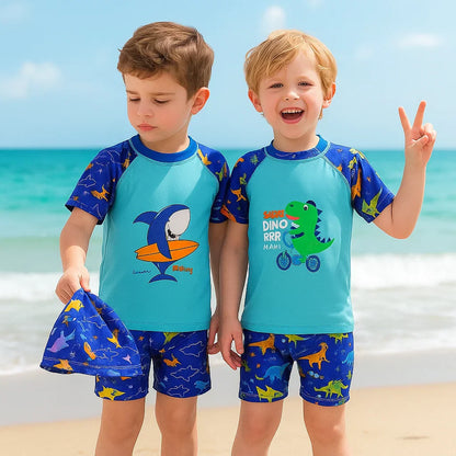 Boy's blue UPF 50+ sun protection swimwear set with shark print, swim shirt, shorts, and cap for beach fun.