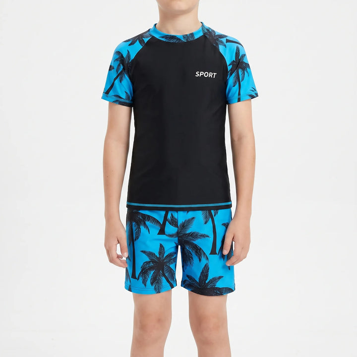 Kids' rash guard and swim shorts set for boys, providing excellent UPF sun protection during summer water sports.