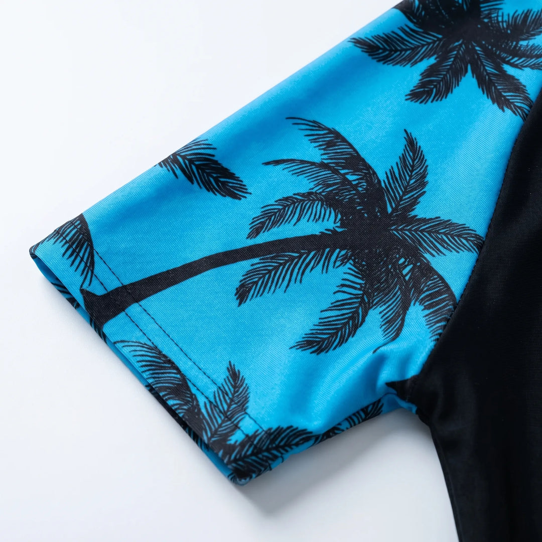 Stylish boys' two-piece swimwear set, perfect for beach, pool, or active water play. Features rash guard top.