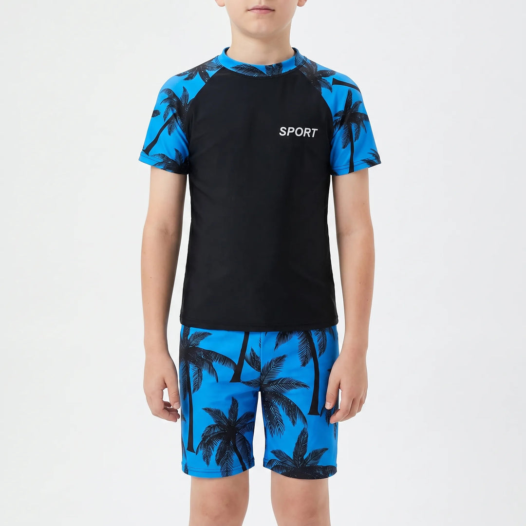 Young boys' active swimwear set for comfortable water sports. Includes quick-dry rash guard and secure swim shorts.