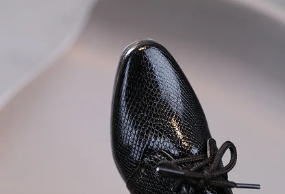 Kids' black formal footwear, perfect for school dress codes and wedding parties.