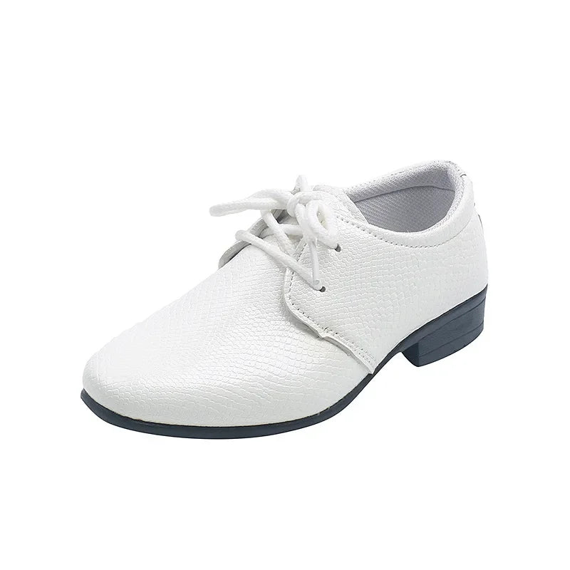 Toddler boys' black dress shoes, ideal for weddings and formal school attire.