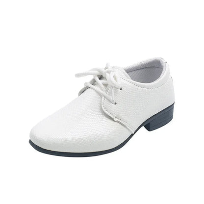 Toddler boys' black dress shoes, ideal for weddings and formal school attire.