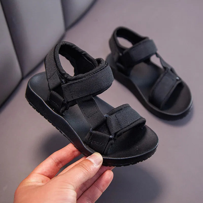 Boys' blue canvas sandals with hook and loop closure, perfect for summer casual wear