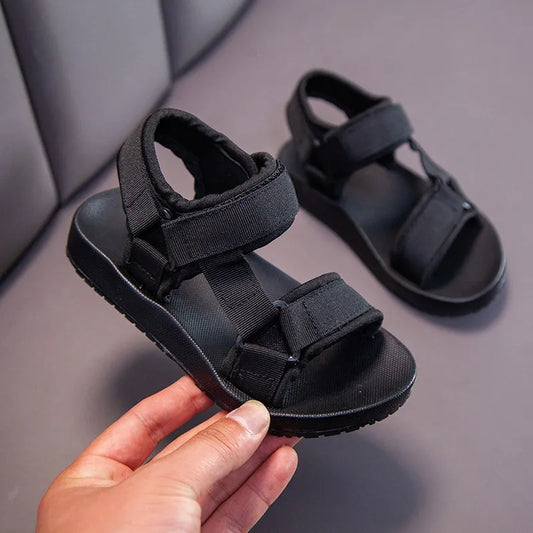 Boys' blue canvas sandals with hook and loop closure, perfect for summer casual wear