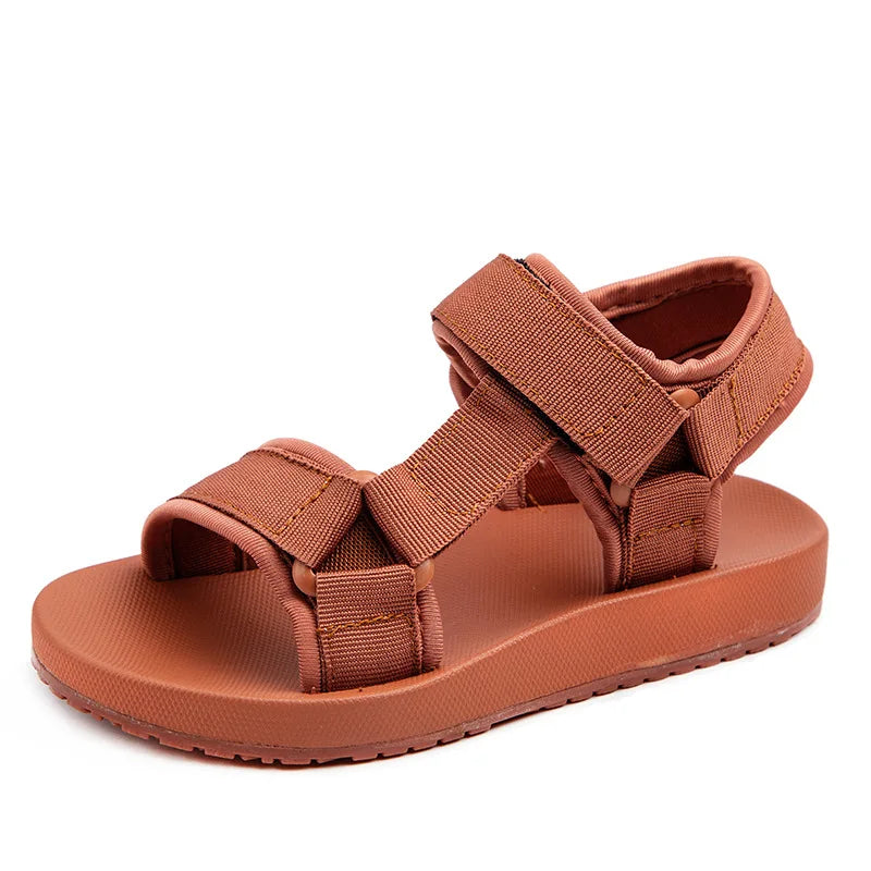 Close-up of boys' canvas sandal showing sturdy stitching and breathable fabric for active kids