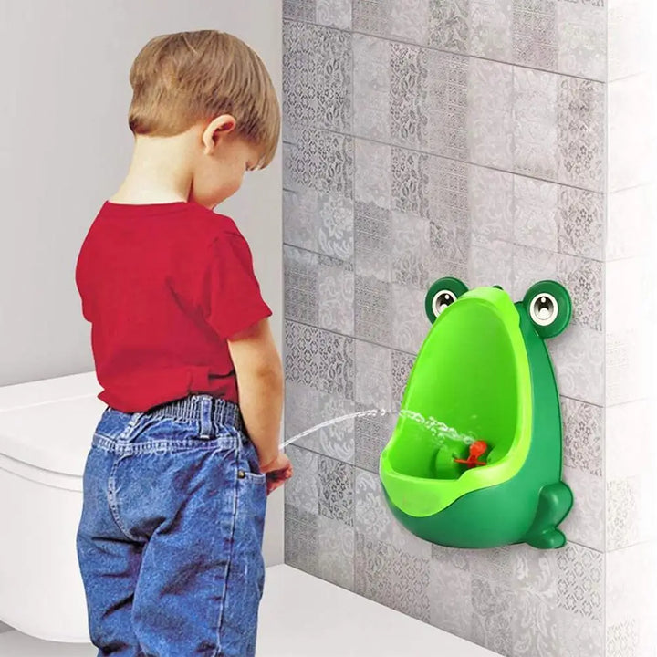 Boys' green frog potty training urinal. Wall-mounted design for toddlers learning to pee.