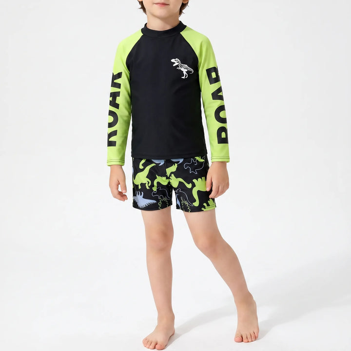 Vibrant two-piece boys' dinosaur swimsuit set, a fun long-sleeve rash guard for summer activewear.