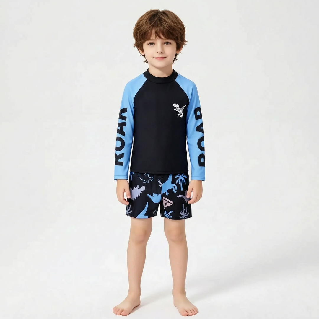 Fun boys' dinosaur long-sleeve swimsuit set, a protective rash guard for kids' summer beach and pool adventures.