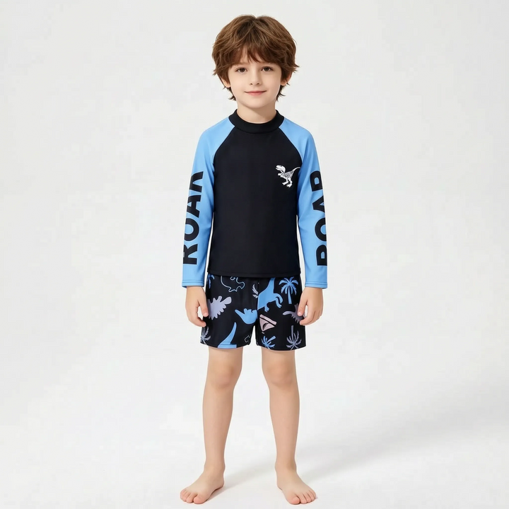 Fun boys' dinosaur long-sleeve swimsuit set, a protective rash guard for kids' summer beach and pool adventures.