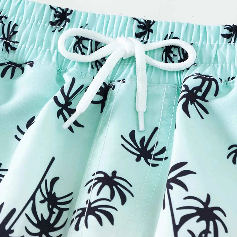 Kids' swimwear: orange quick-dry swim trunks for boys, perfect for summer essentials.