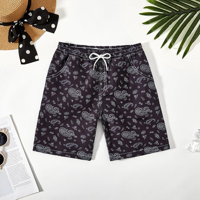 Red boys' swim trunks, quick-dry fabric and soft inner lining, great for beachwear.
